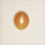 Moonstone Cats Eye Peach Oval 12x10mm 6.47crts