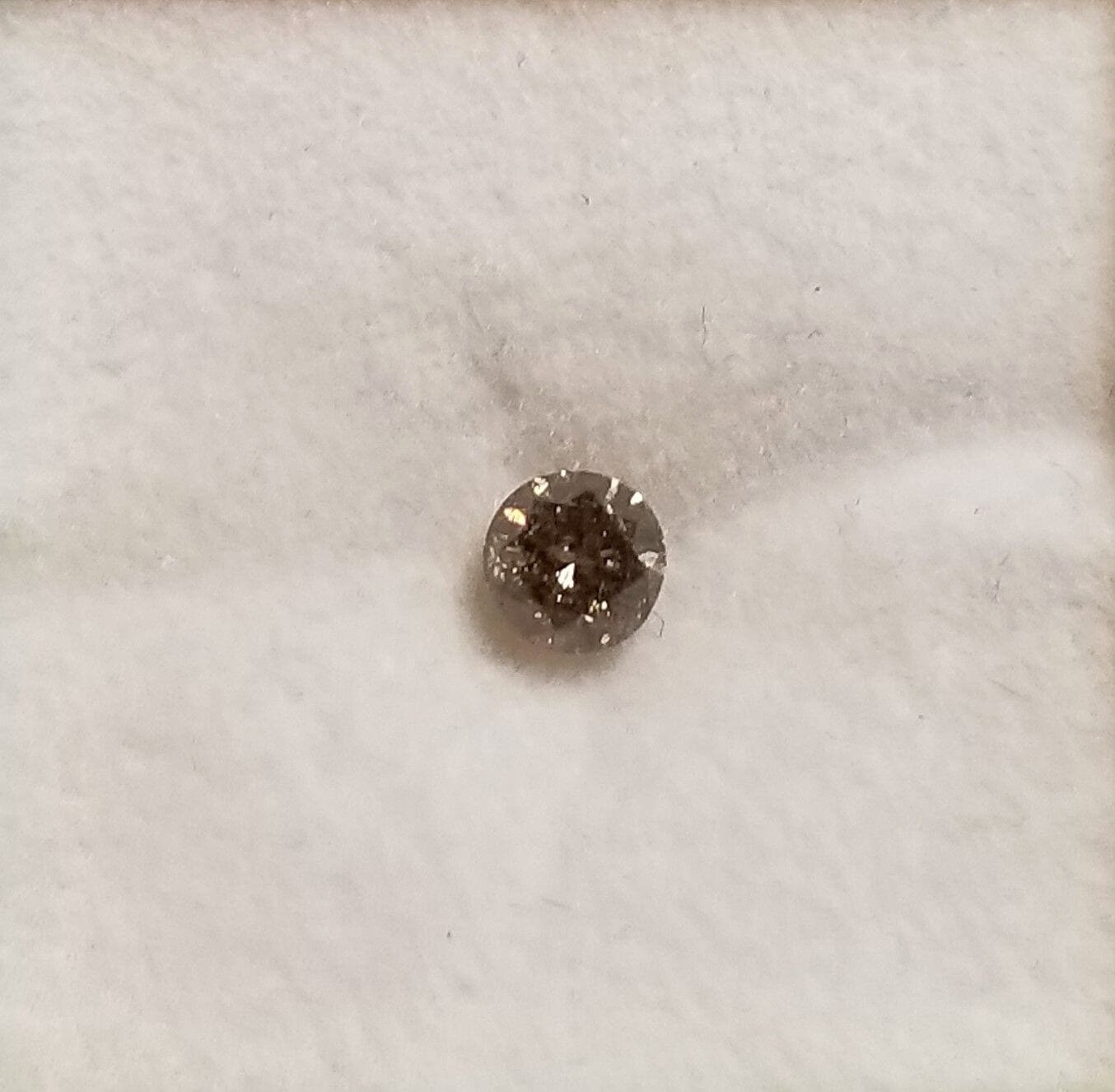 Diamond Champagne Round I1 4.7mm 0.44crts (chipped girdle)