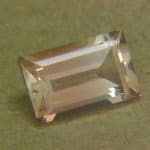 Sunstone Oregon Red Golden Emerald Cut 9x6mm 1.57crts