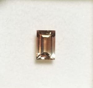 Sunstone Oregon Red Golden Emerald Cut 9x6mm 1.57crts